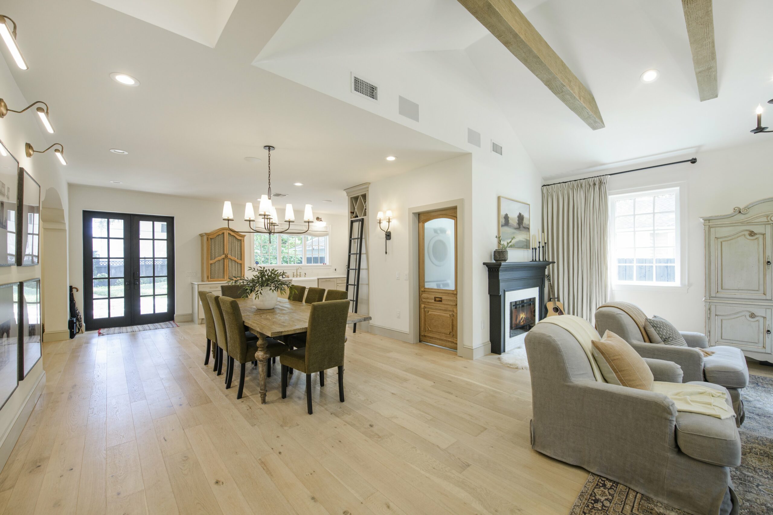 San Jose Realtor reviewing a competitive home offer with buyers in Silicon Valley.